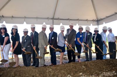 The ceremonial shovel turn included a long line of government officials and project managers.