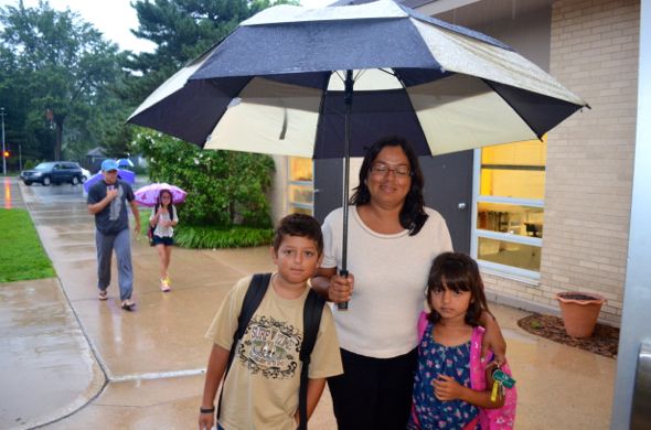 Dalia Welsh brought her first-grader Maria Welsh and fourth-grader Donny Welsh to Westwood View this morning. The family is new to Westwood View this year.