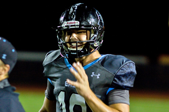 SM East quarterback Christian Blessen was all smiles after the Lancers' shocking victory over Olathe Northwest.
