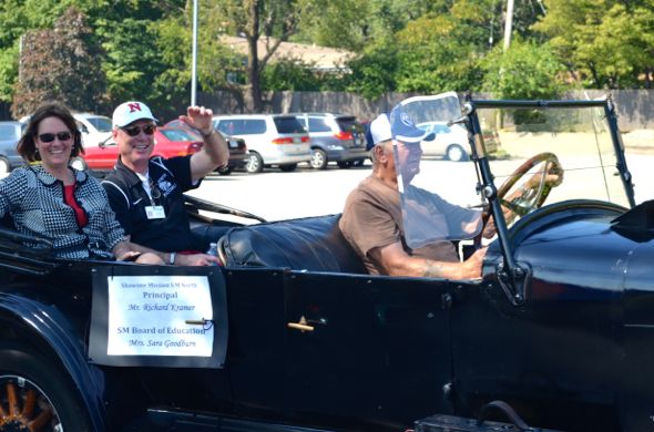 School board member Sara Goodburn and Principal Richard Kramer cruised at the head of the parade.