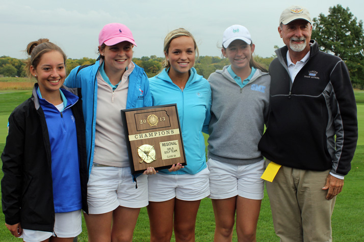 Members of the SM East girls golf team and coach Ermanno Ritschl celebrating their Regionals win.
