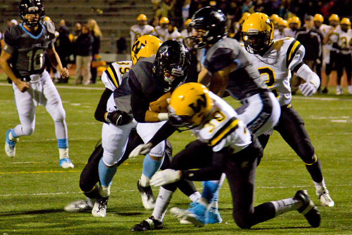 Luke Taylor drove forward for his second touchdown of the night in the third quarter.
