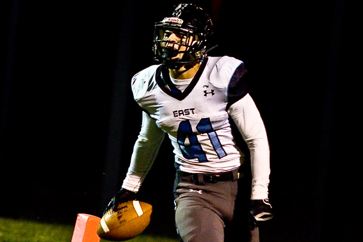 Mitchell Tyler, who had an excellent night on both sides of the ball, celebrated after reeling in the touchdown that put the Lancers ahead for the first time Friday.