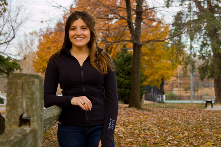 Sacha Nana wearing her company NEVA's athletic jacket at Fariway's Peterson Park, just a few blocks from where she grew up.