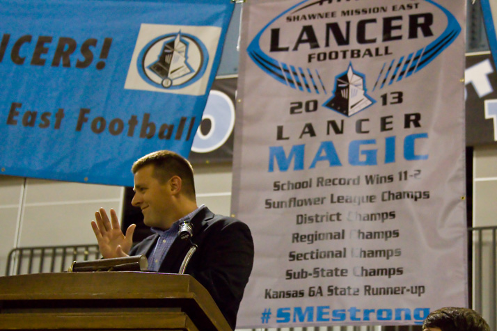 First-year head coach Dustin Delaney stood in front of a banner laying out the team's accomplishments at the annual football banquet Sunday.