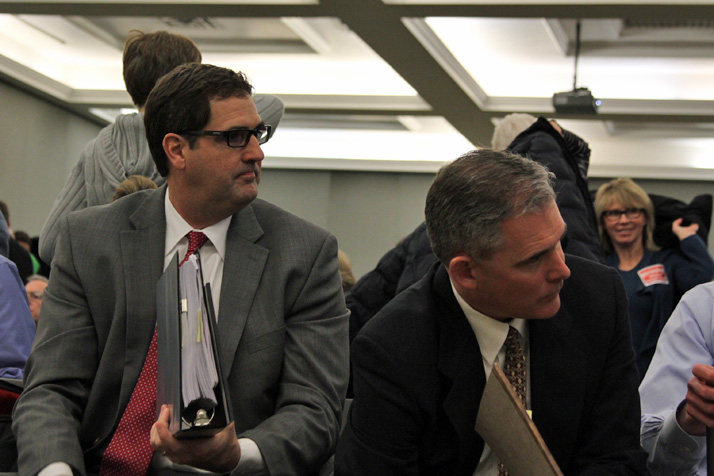 John Duggan and Brian Doerr, representatives of the Mission Valley Neighbors Association, reacted after the council approved the Tutera Group's Mission Chateau proposal.