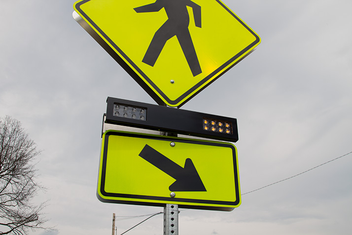 New Rectangular Rapid Flashing Beacons at Weltner Park are designed to improve pedestrian safety along Cambridge Drive.