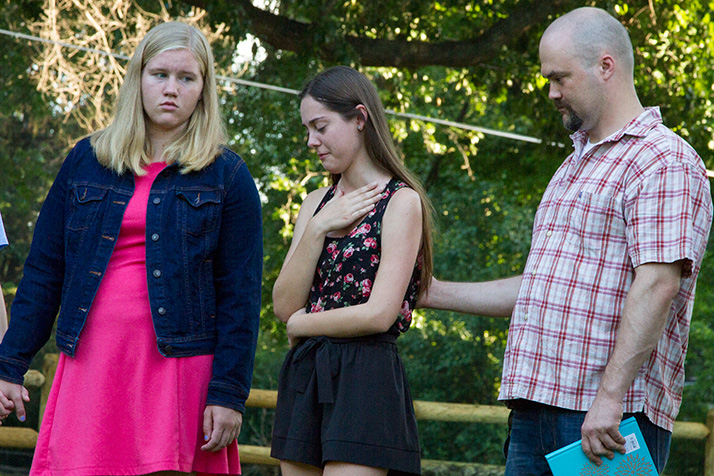 Mark Harken's girlfriend Jennifer Noble spoke through tears at the vigil.