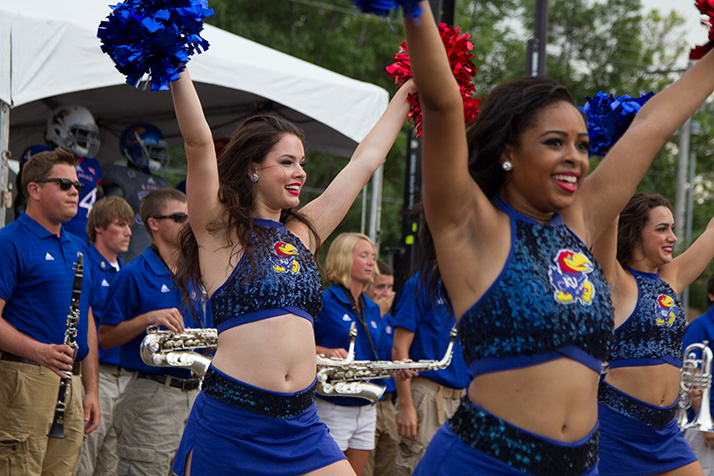 The KU cheerleaders pumped up the crowd before members of the athletics department got on stage.