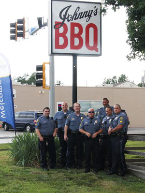 Mission police waited tables at Johnny's BBQ to raise funds for the Special Olympics.