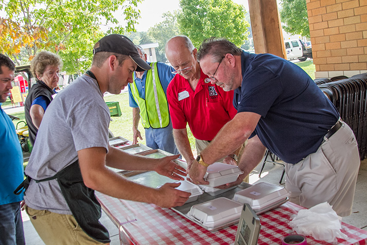 Noah Hall turns in his chicken entry to the judges table.