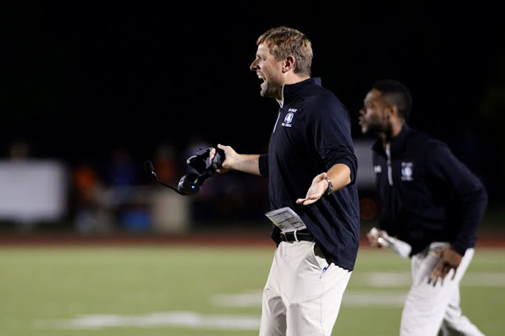 Coach Dustin Delaney shifted toward a focus on the run after the Lancers threw a pick-six interception, giving SM Northwest its only points of the night. Photo by Gracie Guignon.