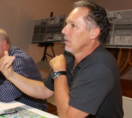 Juan Swart hopes a renewed volume of customers create a need for more parking. Photo by Bill Nichols