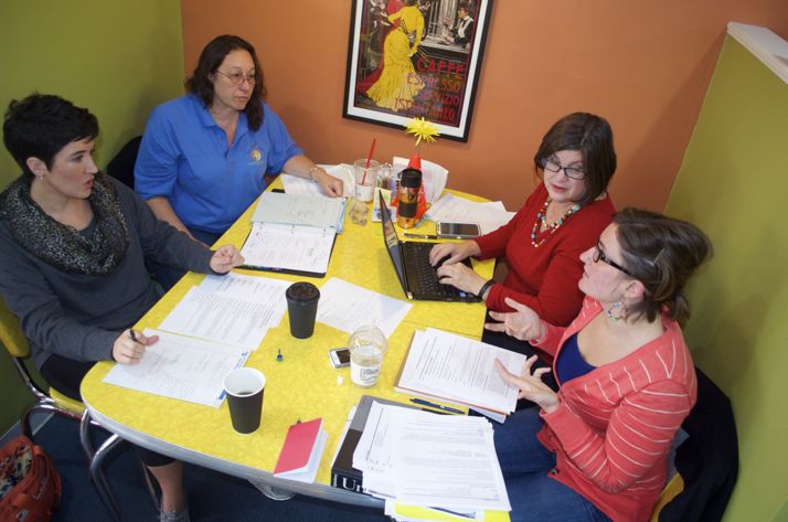 Leadership Northeast alumni (clockwise from bottom left) Kinsley Riggs, Beth Berier and Teresa Kelly meet with the Chamber's Lauren Vaughn to plan the 2015 session recently at Twisted Sisters Coffee Shop.