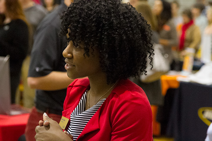 Sandra DuPree of UMKC's office of admissions answered questions to attendees in the packed SM East main gym.