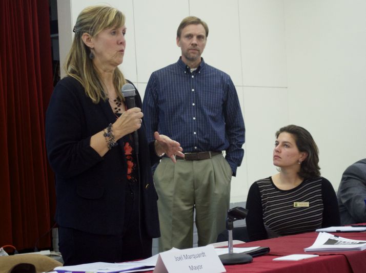 Roeland Park Councilor Becky Fast addresses a community discussion on rental housing while Mayor Joel Marquardt and councilor Jennifer Gunby listen.