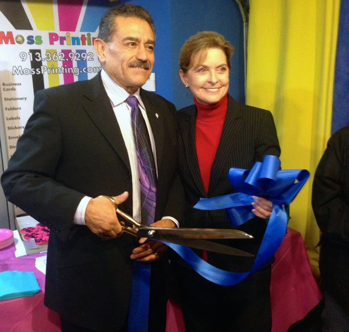 Jose and Tina Ramirez cut the ribbon to open the Moss Printing location in Merriam late last year.