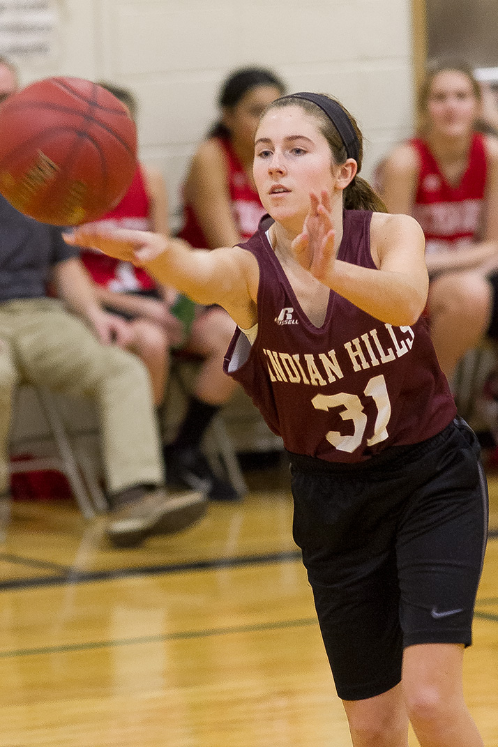 Maddie Mustoe dished the ball near center court Wednesday against Hocker Grove.