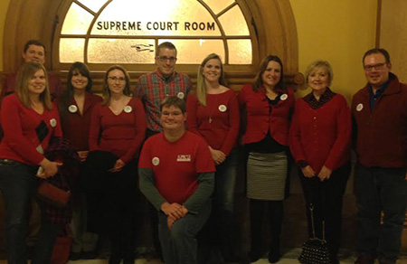 Game On for Public Schools parents at the state capitol the night of Gov. Brownback's State of the State address. Photo courtesy Heather Ousley.