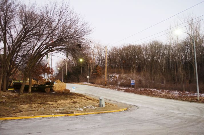 The new apartment complex would be built on undeveloped land (to the right) across 51st Street from existing apartments.