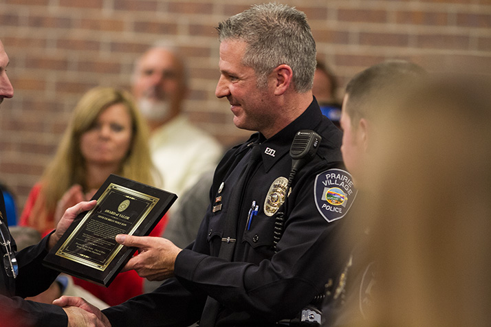Officer Brian Wolf received the Award of Valor — the highest given by the Prairie Village Police — for his part in apprehending the Bank of America robbers.