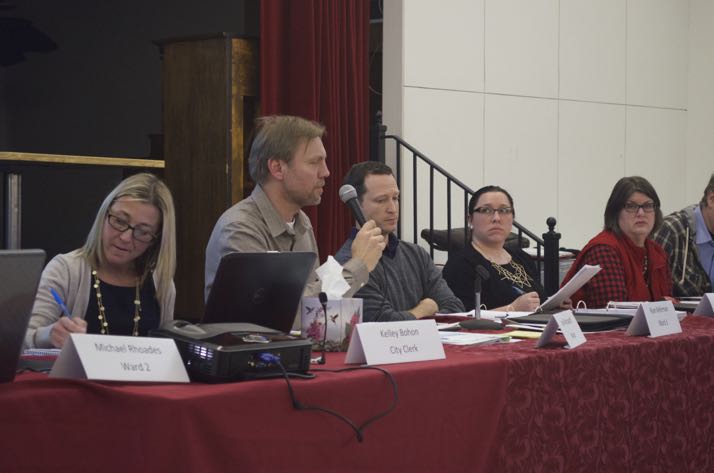 Mayor Joel Marquardt spoke about the conflict over chair of an ad hoc committee while Councilors Ryan Kellerman and Megan England listen.