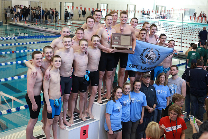 SM East's boys swim and dive team celebrated their state 6A title Saturday in Topeka.