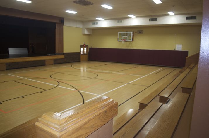 The gym in the community center, which has had flooring replaced, was part of a 1930s addition.