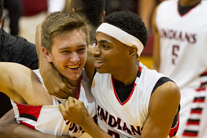 Cole Gibson (left) and Michael Weathers celebrated after the Indians secured their first trip to state since 2002.