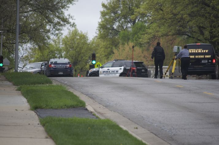 A Prairie Village police car appeared to have collided with the suspect's vehicle following the early morning Sunday arrest as investigators canvassed the area.