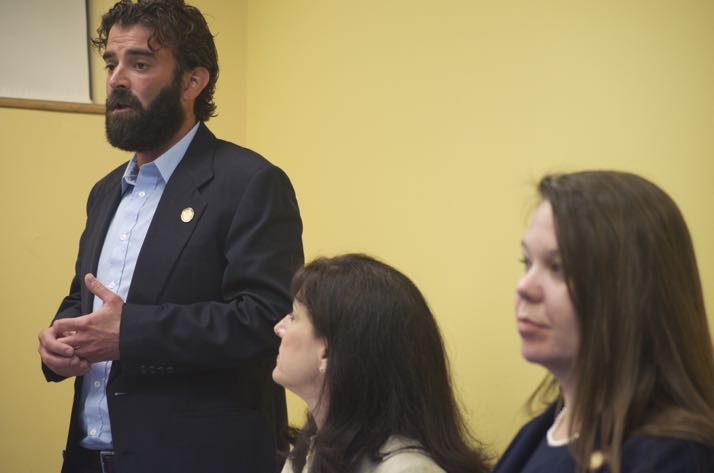 Rep. Jarrod Ousley speaking Saturday morning as Rep.s Melissa Rooker and Stephanie Clayton listen.