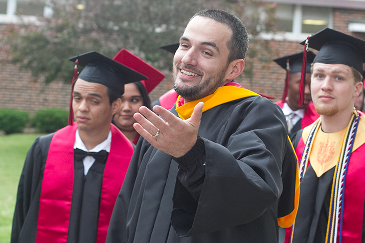 Drama instructor and football coach Ben Bartlett has seen SM North graduation as both a student and a teacher.