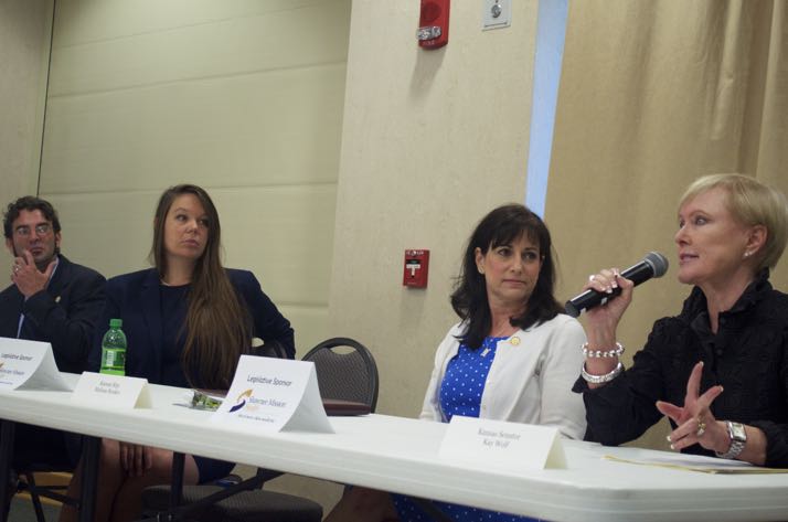 Rep Jarrod Ousley, Rep. Stephanie Clayton, Rep. Melissa Rooker listen as Sen. Kay Wolf answers a question Saturday.