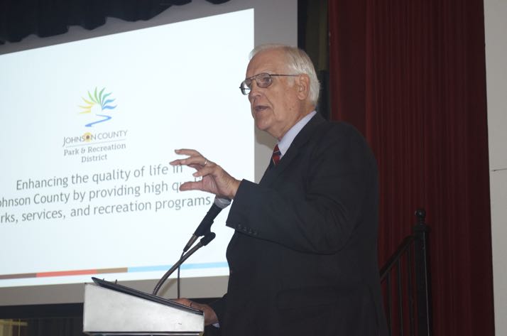 Johnson County Chair Ed Eilert speaking Friday at the Northeast Johnson County Chamber of Commerce luncheon at the Roeland Park community Center.