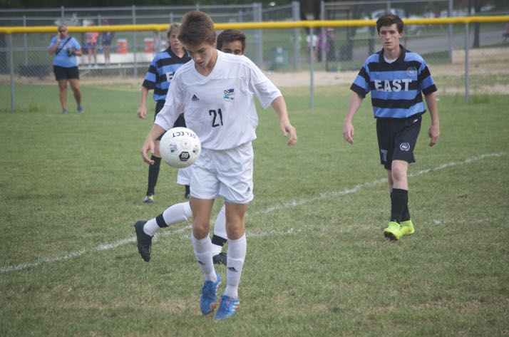 The SM East varsity soccer team was in action during the annual Blue/Black scrimmage.