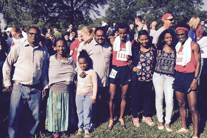 The Akalu family celebrated after Belesti and Alex's speedy performances Saturday. Photo via SM North Athletics Twitter.