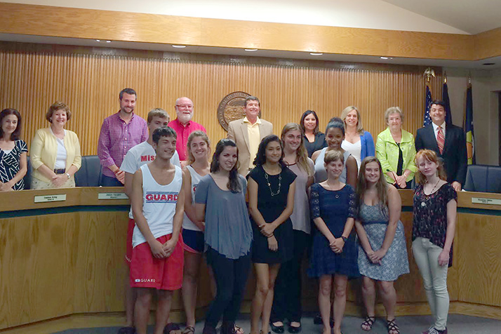 Mission lifeguards had their picture taken with the city council after making a presentation asking for a raise.