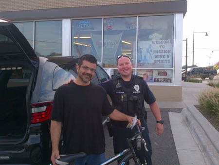 Roeland Park Police Department officer Zack Stamper delivered a bicycle to the man police described as Sam. Photo courtesy of Roeland Park police.