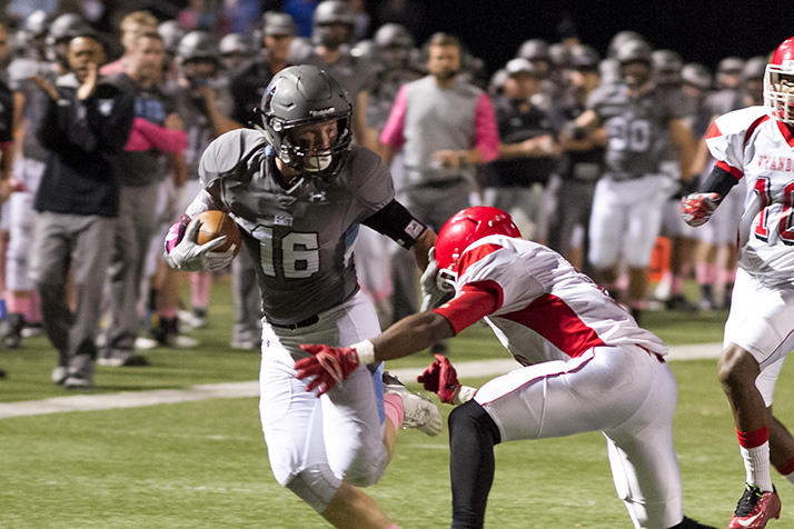 Defensive back Jake Randa sprints toward the endzone after intercepting a Wyandotte pass. He was tackled just short of the goal line.