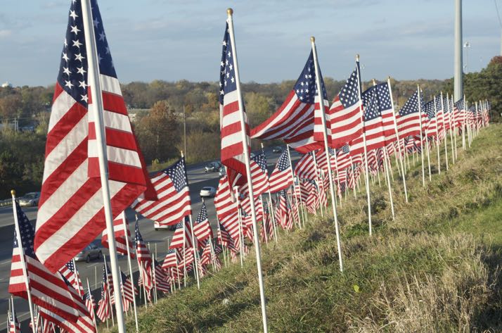 Approximately 750 American Flags greet drivers along I-35 in Merriam.