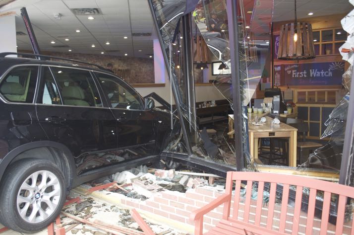 The BMW was embedded into the First Watch restaurant in Fairway Friday afternoon.