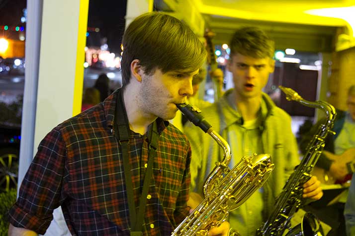 Matt Lindboe piped a baritone sax solo as the jazz ensemble played outside Tavern.