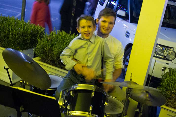 A little help on the drums from a little brother.