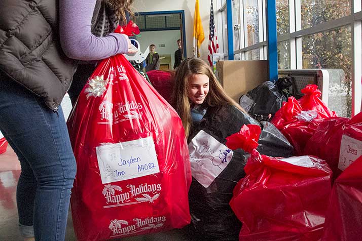 The halls of St. Ann were lined with bags to be loaded up Friday afternoon.