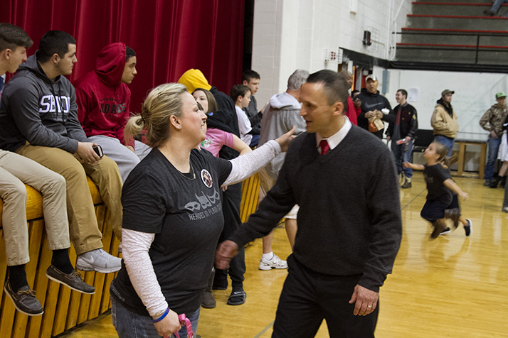 Carolyn Macan had a hug for girls basketball coach Brian Macintosh.