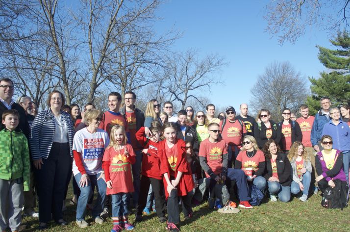 Walkers and supporters gathered in Merriam Friday before heading for Topeka on a three-day walk for public education.
