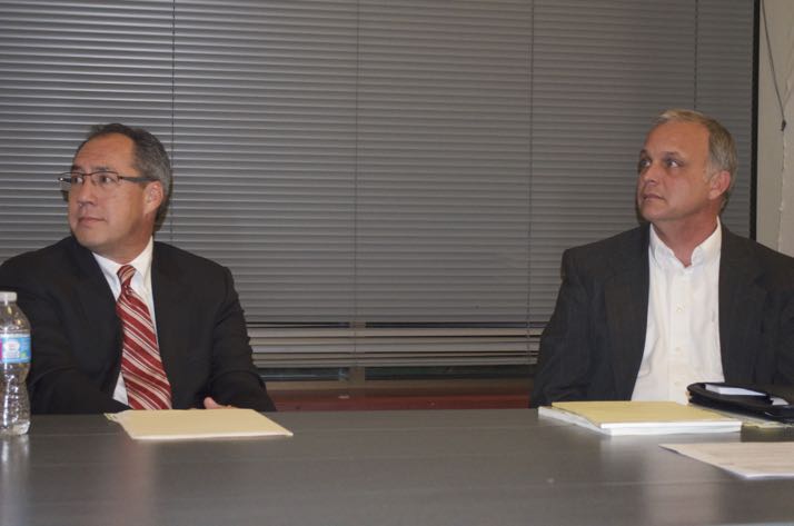 Westwood Mayor John Yé and challenger Jim Donovan listen to a question from modertor Brian Brown.