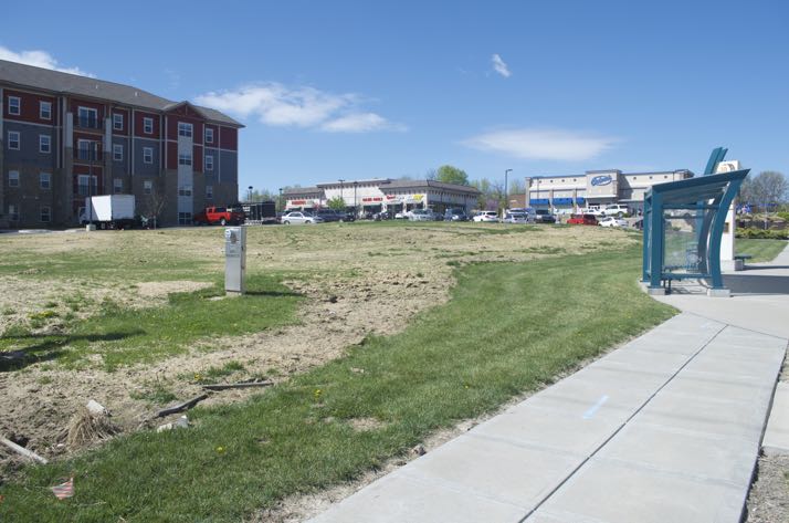 The new park will take shape at Broadmoor and Martway. The site has a bus shelter. The Welstone apartments border the park area.