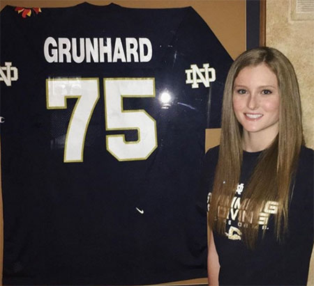 Cailey Grunhard committed to swim at Notre Dame, where her father played football, last week.