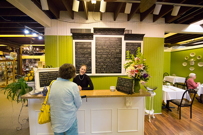 Kendra Dobson greets patrons at the new Courtyard Cafe in Prairie Village.